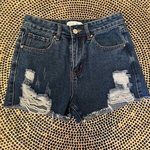 KHAKI + blue distressed denim shorts with embroidered butterfly on back pocket